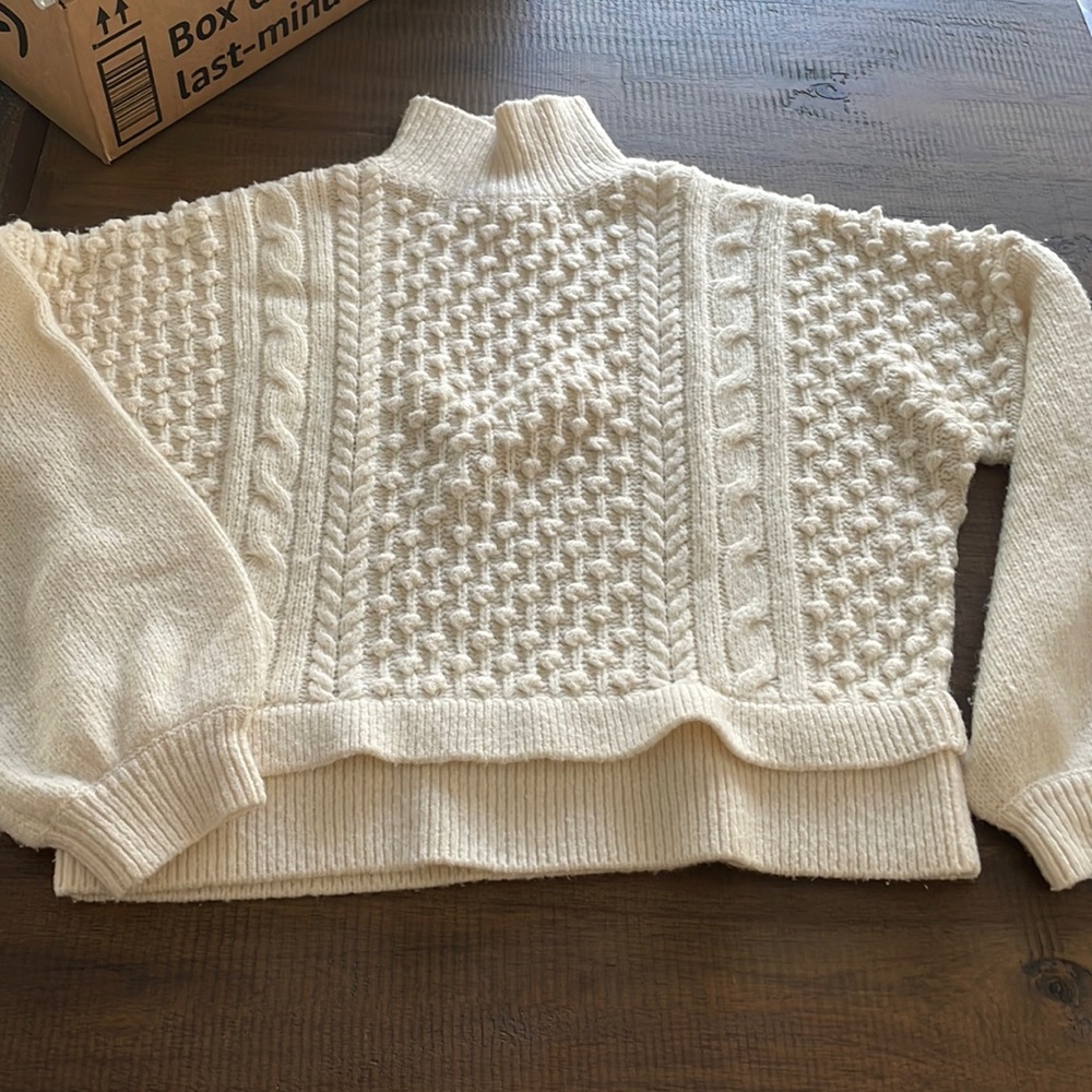 Frame knit sweater